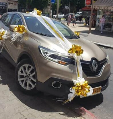 קישוט רכב בזהב וטול בפתח תקווה